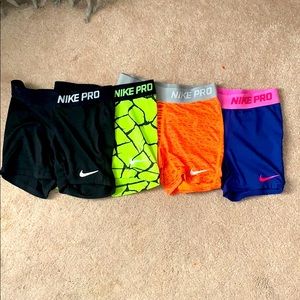 4 pairs of nike pros!!